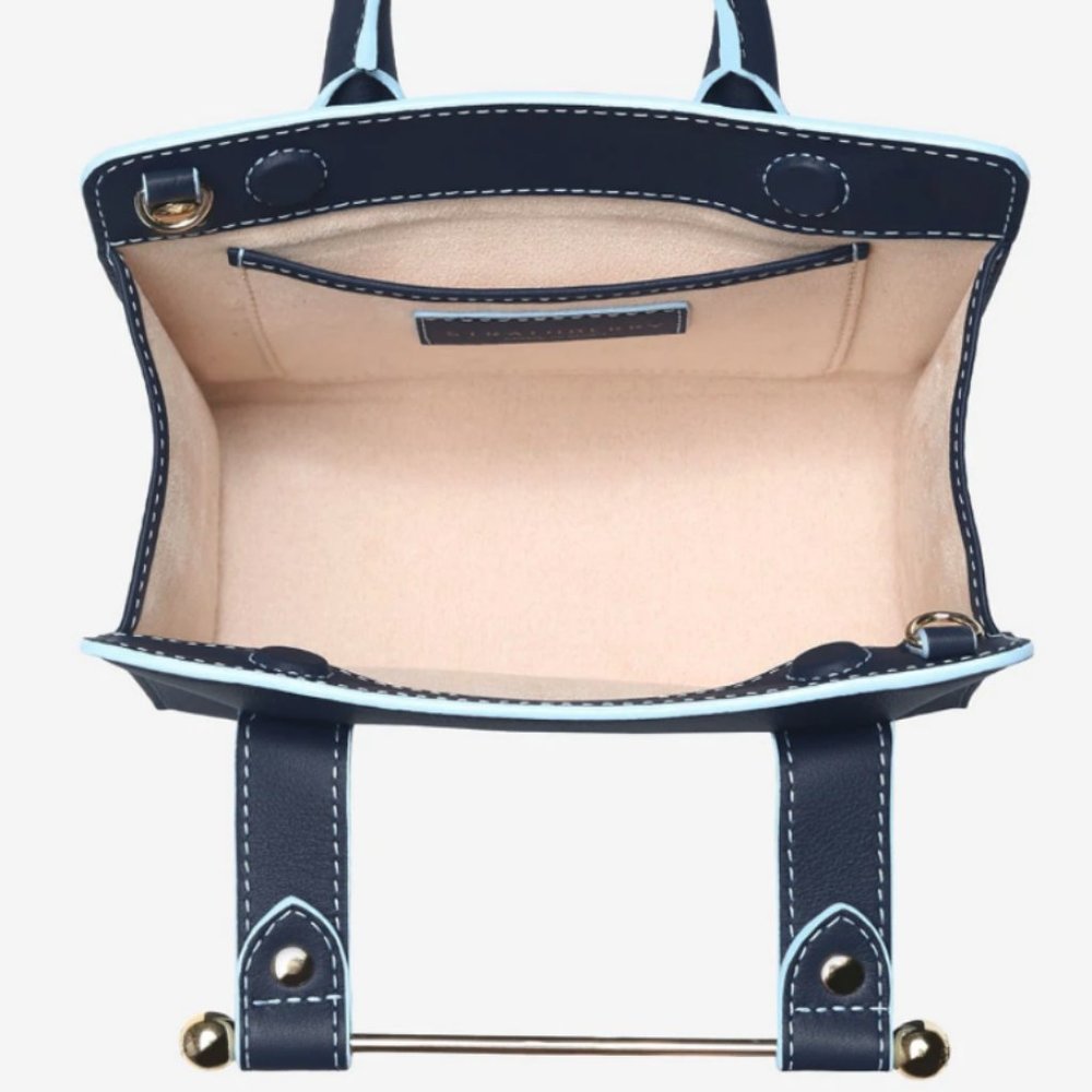The Strathberry Nano Leather Tote in Navy /Sky Blue Edge Stitch MSRP$505
